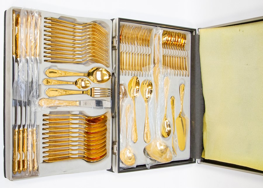 A Solingen German gold plated 70 piece canteen of cutlery, each piece 23ct gold plated, comprising