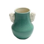 Poole Pottery vase by John Adams, pale green glaze and two cream glazed handles as doves, marked