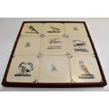 A framed set of nine Poole Pottery tiles of water birds, by Harold Stabler  Condition: No obvious