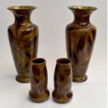 Two pairs of Royal Doulton leaf pattern vases, brown ground, early to mid 20th century