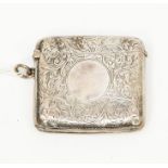 An Edwardian silver vesta, chased with foliate scrolls, vacant cartouche, Birmingham 1908, approx