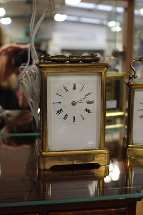 An early 20th Century brass carriage clock, in need of a clean, some damage, complete with key, - Image 2 of 4