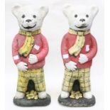 A pair of Rupert figural garden ornaments, height approx. 50cm.