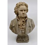 An early 20th Century ceramic bust of Beethoven  Condition: Head has been broken off and reglued.