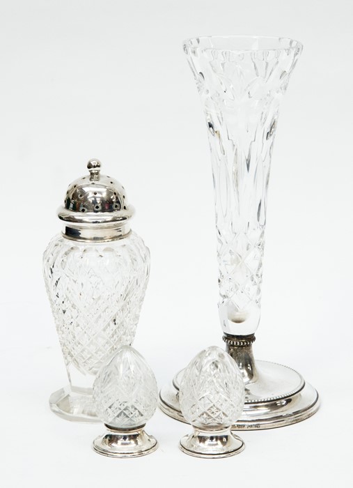 A glass and silver sugar castor, Sheffield 1907, together with a cut glass and silver hallmarked