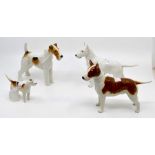 A collection of J Beswick dogs, two bull terriers, fox terrier and a fox hound Condition: Tip of