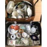 A collection of Continental and English ceramics incuding ring boxes, posy dishes, dressing table