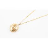 A 9ct gold oval locket approx. 20mm x 15mm, on a 9ct gold chain, length approx. 16'', the locket and