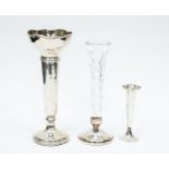 A silver candle stick, fancy shaped rim, height approx. 210mm, Birmingham 1912, maker E.S Barnsley &