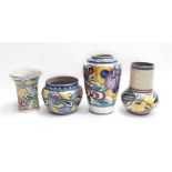 3 Poole pottery vases together with Poole pottery plant pot in traditional floral patterns, no