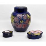 Collection of William Moorcroft mid to late 20th century: ginger jar and two pin dishes Condition: