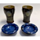Pair of Royal Doulton mid 20th century vases, green ground, along with a pair of blue ground Doulton