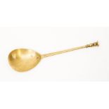 A 17th century style brass seal topped spoon, approx 17cm long