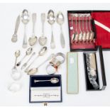 A collection of silver, unmarked white matal and continental 800 items, to include a cased set of