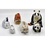 Five boxed Royal Crown Derby paperweights, Gold stoppers, Giant Panda, Baby Panda, Wombat, Red