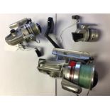 Angling interest: A collection of three fishing reels and lures to include: a Kmart SK-001, a