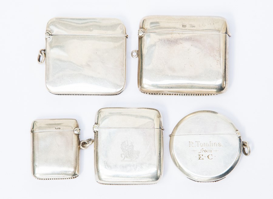 Five plain silver vesta cases, one engraved with crest, another with inscription, various dates