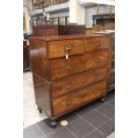 An early 19th mahogany and brass campaign chest of drawers, circa 1820, rectangular top with brass