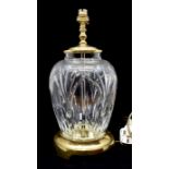 A Waterford cut glass table lamp, ovoid form, with a brass mount and brass base Condition: No