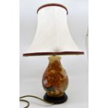 Late 20th Century Moorcroft table lamp, with original shade, bird and fruit design, orange ground