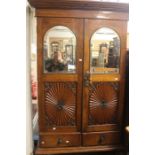 Late 19th, early 20th Century Continental oak cupboard with two doors, mirrored above two single