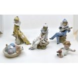Collection of Nao figures, five in total, comprising clowns, dog and boy playing football Condition: