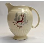 A 1930's Crown Devon Fieldings Art Deco water jug, hand painted with a reindeer with a snowy