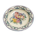 Poole pottery large 528 pattern charger, decorated with floral sprays and ribbon, marked to base,