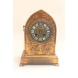 A mid 19th Century French mantel clock, encased in repousse copper work, entitled Carpe Diem