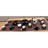 A Royal Albert 'Masquerade' part coffee set, comprising coffee pot, nine cups, nine saucers, milk