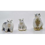 Three boxed Royal Crown Derby paperweights, Gold stoppers, Standing Polar Bear, Sitting Polar Bear