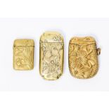 Victorian brass novelty vesta cases; one embossed with a crocodile above palm leaves with suspension