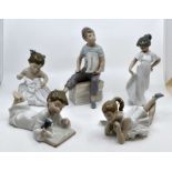 Collection of five Nao figures of young boys and girls.