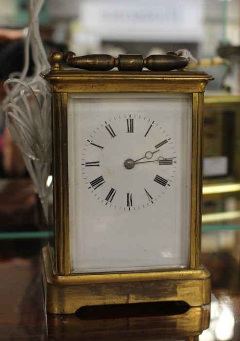 An early 20th Century brass carriage clock, in need of a clean, some damage, complete with key, - Image 3 of 4