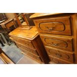 A 20th Century cherry wood bedroom suite, Ponsford, Sheffield, a comprising 3 tier chest of
