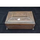 A carved hardwood 19th Century Indian vanity box with lions feet carved body internal mirror lift