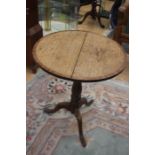 A 19th Century tilt tripod top wine table, oak