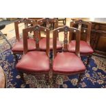 A set of six late Victorian dining chairs on castors, Art Nouveau designed leatherette seats in