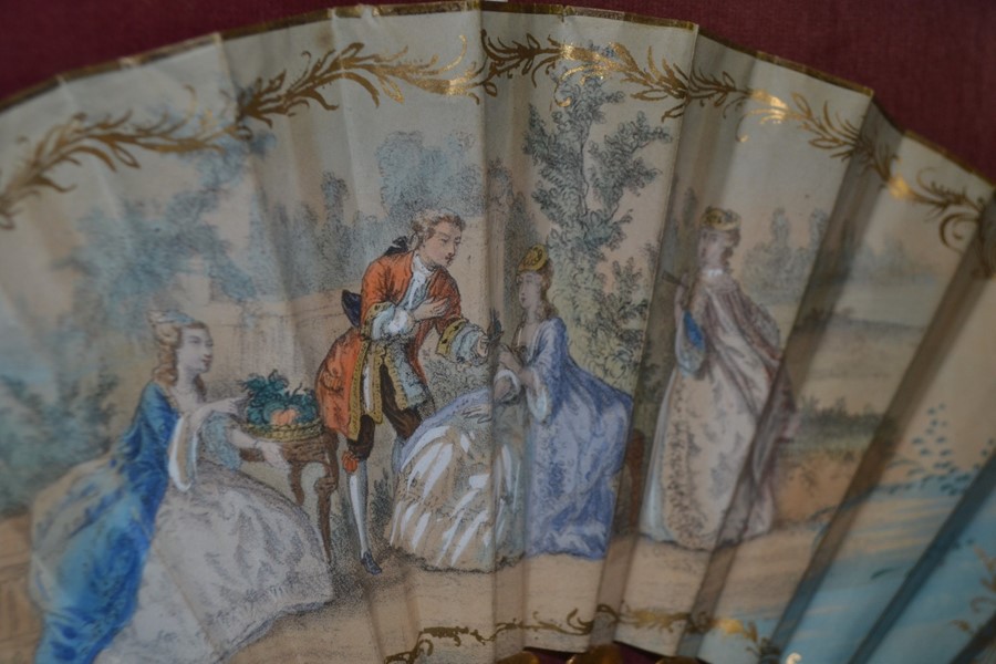 A Victorian hand painted fan, depicting an 18th Century courting couple, presented in a framed case, - Image 2 of 2