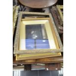 A large collection of medium-sized 19th Century Gesso-edged frames in various states of repair