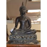 A large bronze figure of a seated buddha, approx 57cm high