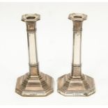 A pair of silver candlesticks, with detachable sconces, approx 18.5cm high, Birmingham 1911