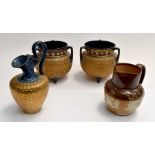 A pair of Royal Doulton Lambeth three handled jardinieres, a similar jug and a further jug with