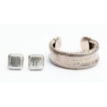 A woven silver cuff bangle, by Cummings Sterling 1985, width approx.. 22cm wide along with