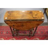 A Victorian oak gateleg table, barley twist legs