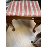 A 19th Century style mahogany stool.