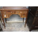 A 19th Century ladies small desk, low boy with four drawers