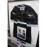 A framed and glazed boxers robe, Everlast, signed