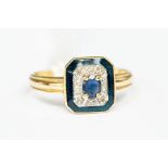A sapphire, diamond and enamel 18ct gold ring, the oval sapphire claw set to the centre, within a