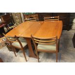 G Plan; circa 1970's teak drop leaf table and four matching chairs